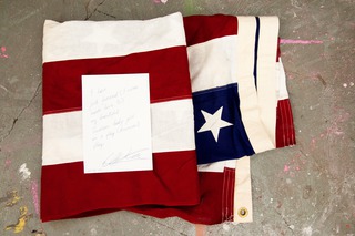 Romantic Testimony (American Flag Obsession in New York), 2013, performance/painting collaboration with Will Hudson, vintage American flag, paper (scale depending on how it is shown), address is subject to confidentiality agreement with Will Hudson, Manhattan, New York